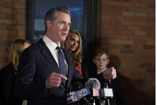 California Gov. Gavin Newsom, accompanied by his wife, Jennifer Siebel Newsom and their children, delivers remarks after winning his second term in office, in Sacramento, Calif., Tuesday, Nov. 8, 2022. (AP Photo/Rich Pedroncelli)