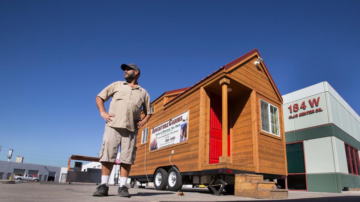 Travis Saenz of Adventure Cabins, a San Bernardino company that makes tiny homes, has had trouble selling the dwellings because of zoning restrictions.