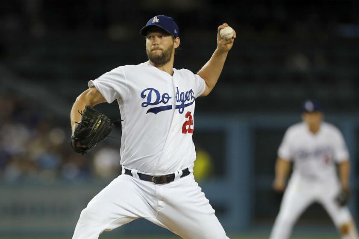 Dodgers ace Clayton Kershaw delivers a pitch against the St. Louis Cardinals in 2015.