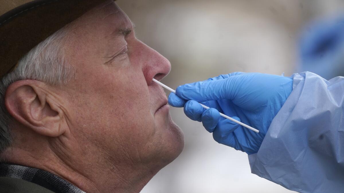 A man gets a coronavirus test.
