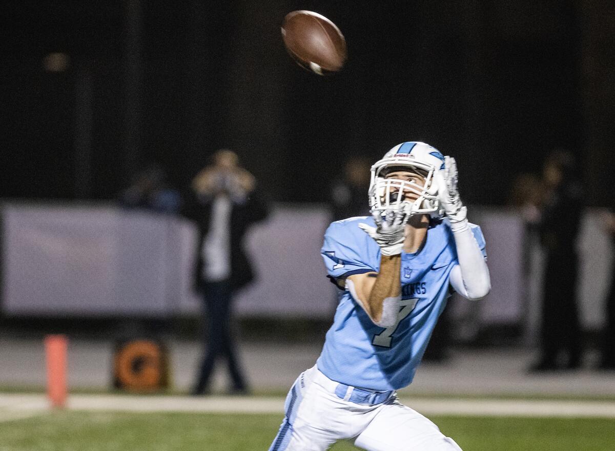 Corona del Mar's John Tipton makes an uncontested catch in the end zone for a touchdown against Newport Harbor.