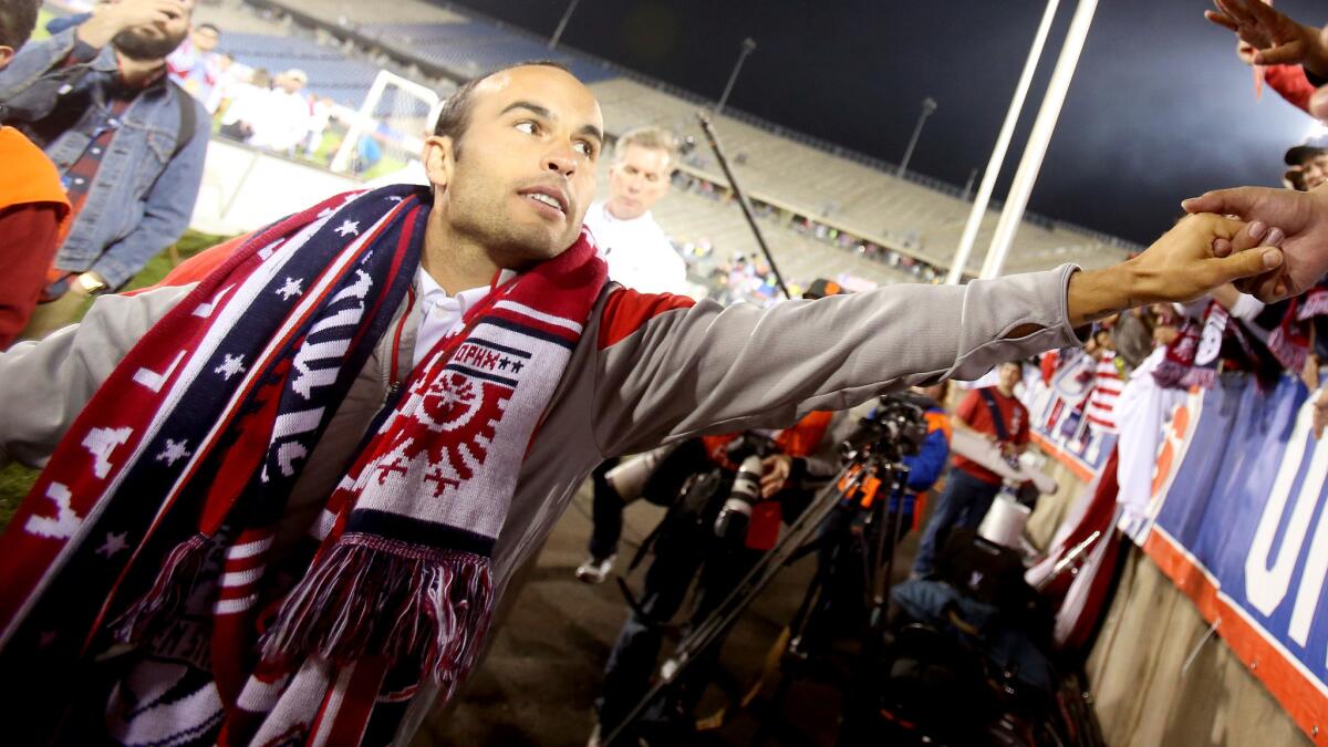 Landon Donovan acknowledges the fans after playing in his final match for the U.S. men's national team Friday against Ecuador in Hartford, Conn.