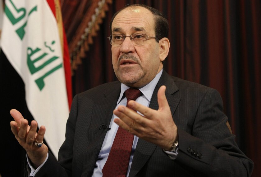 File -- In this Saturday, Dec. 3, 2011 file photo, Iraq's Shiite Prime Minister Nouri al-Maliki is seen during an interview with The Associated Press in Baghdad, Iraq. In results announced Monday, May 19, 2014, State of Law, a coalition led by Al-Maliki has emerged as the biggest winner in the country’s April 30 parliamentary elections. Al-Maliki must now reach out to other blocs to try to cobble together a ruling coalition. That process could take months. (AP Photo/Hadi Mizban, File)