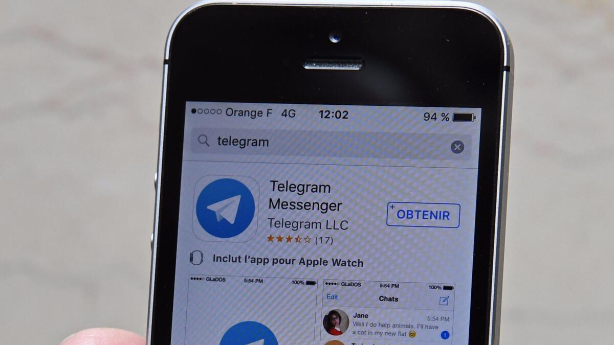 The Telegram Messenger application is shown on a smartphone in Paris in 2016.