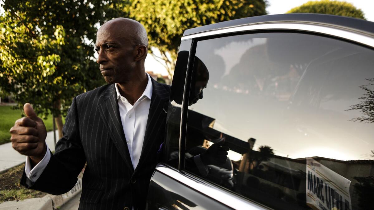 Little canvasses a neighborhood near his campaign headquarters in Inglewood.