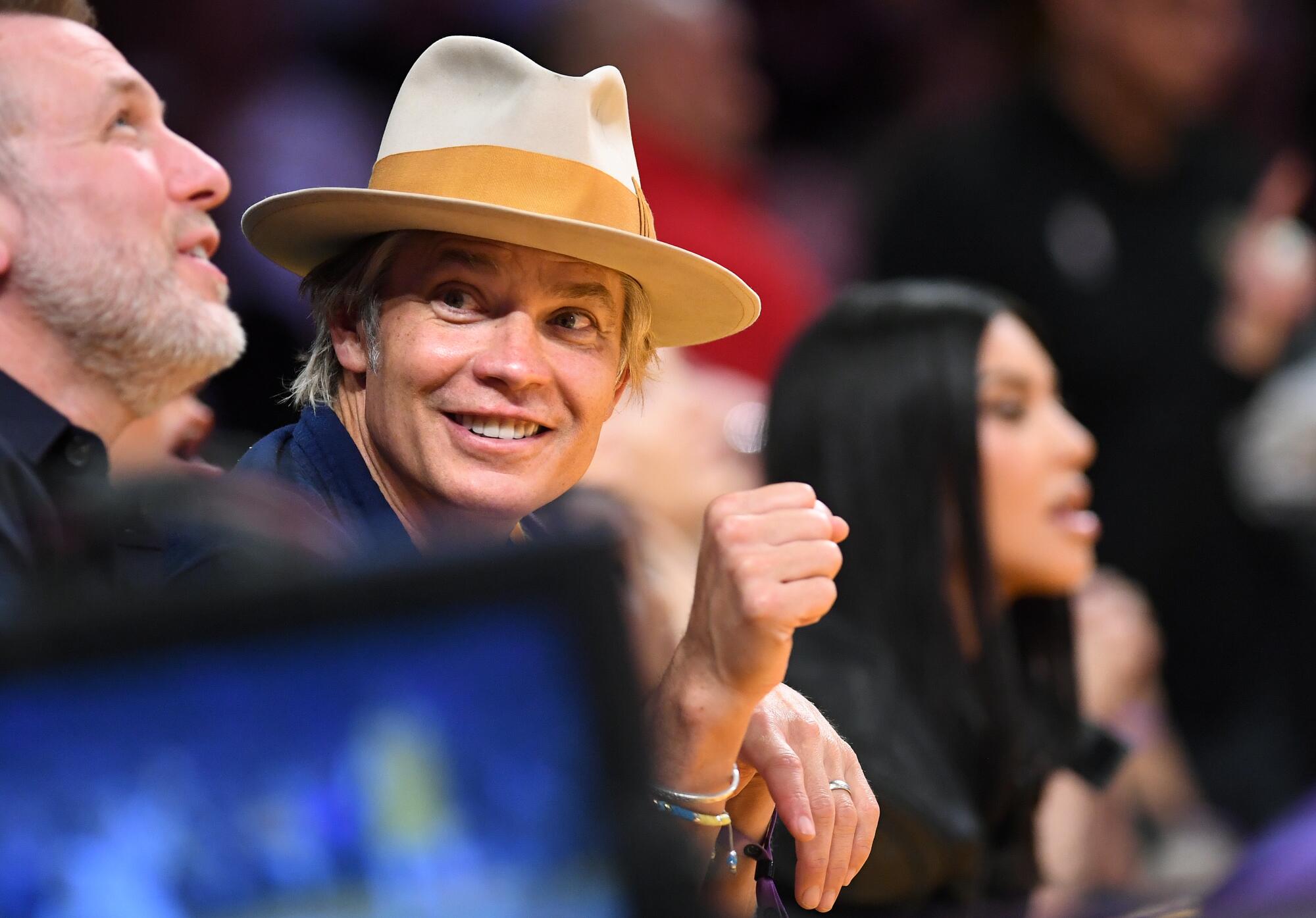 Timothy Olyphant attends a basketball game.
