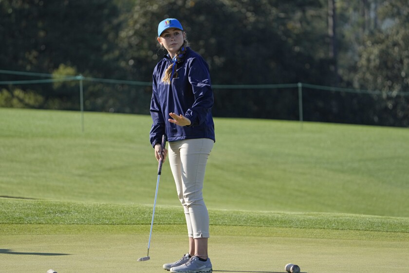 Ali Mulhall, of Henderson, Nevada, reacts to her putt during the Drive Chip & Putt National Finals at Augusta National Golf Club, Sunday, April 4, 2021, in Augusta, Ga. (AP Photo/David J. Phillip)