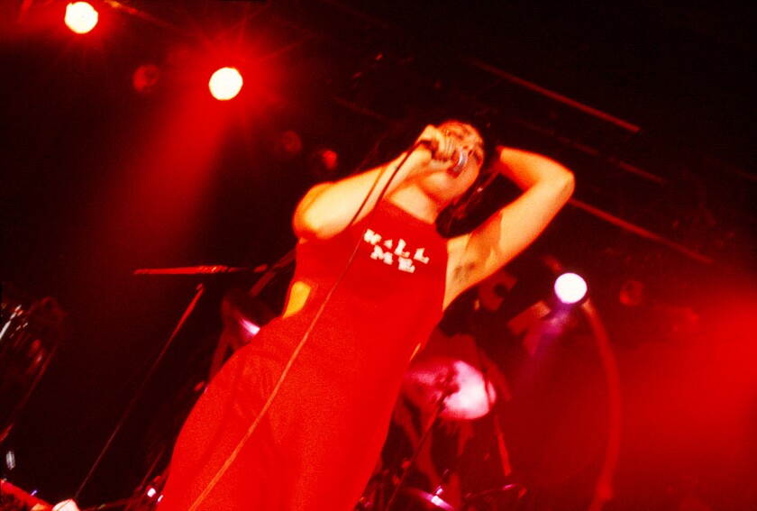 Bikini Kill’s Kathleen Hanna performs at a Rock for Choice concert at the Hollywood Palladium on April 30, 1993