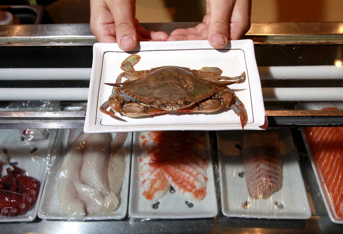 The live soft shell crab prepared by sushi chef and owner Sota Akiyama at Sota restaurant in Corona Del Mar.