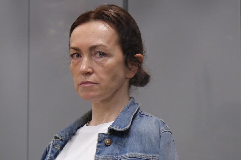 FILE - Alsu Kurmasheva, an editor for the U.S. government-funded Radio Free Europe/Radio Liberty's Tatar-Bashkir service, attends a court hearing in Kazan, Russia on May 31, 2024. A Russian court has convicted Kurmasheva of spreading false information about the Russian army and sentenced her to 6½ years in prison after a secret trial, court records and officials said Monday July 22, 2024. (AP Photo, File)