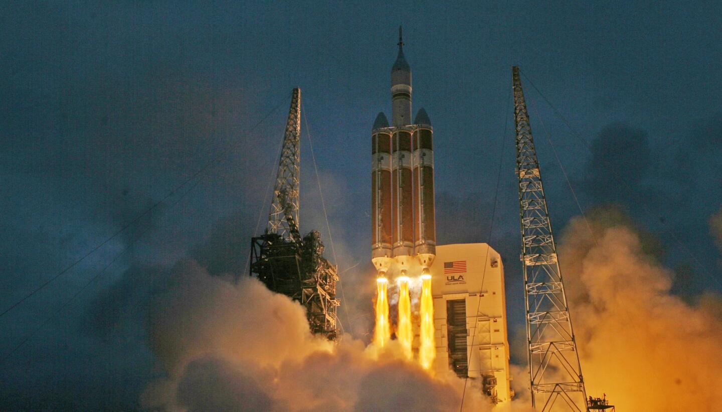 Delta IV Heavy rocket carrying the Orion spacecraft launches Friday, December 5, 2014 at launch complex 37B at Cape Canaveral.