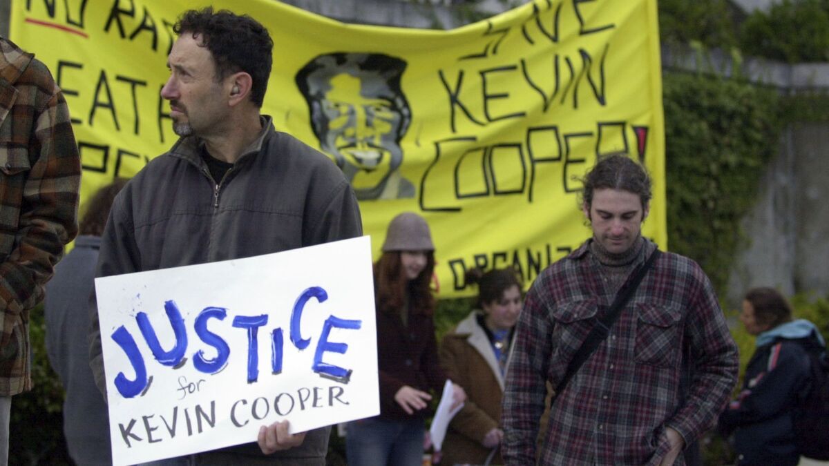 Anti-death-penalty advocates demonstrate in support of convicted killer Kevin Cooper in San Francisco in 2004.