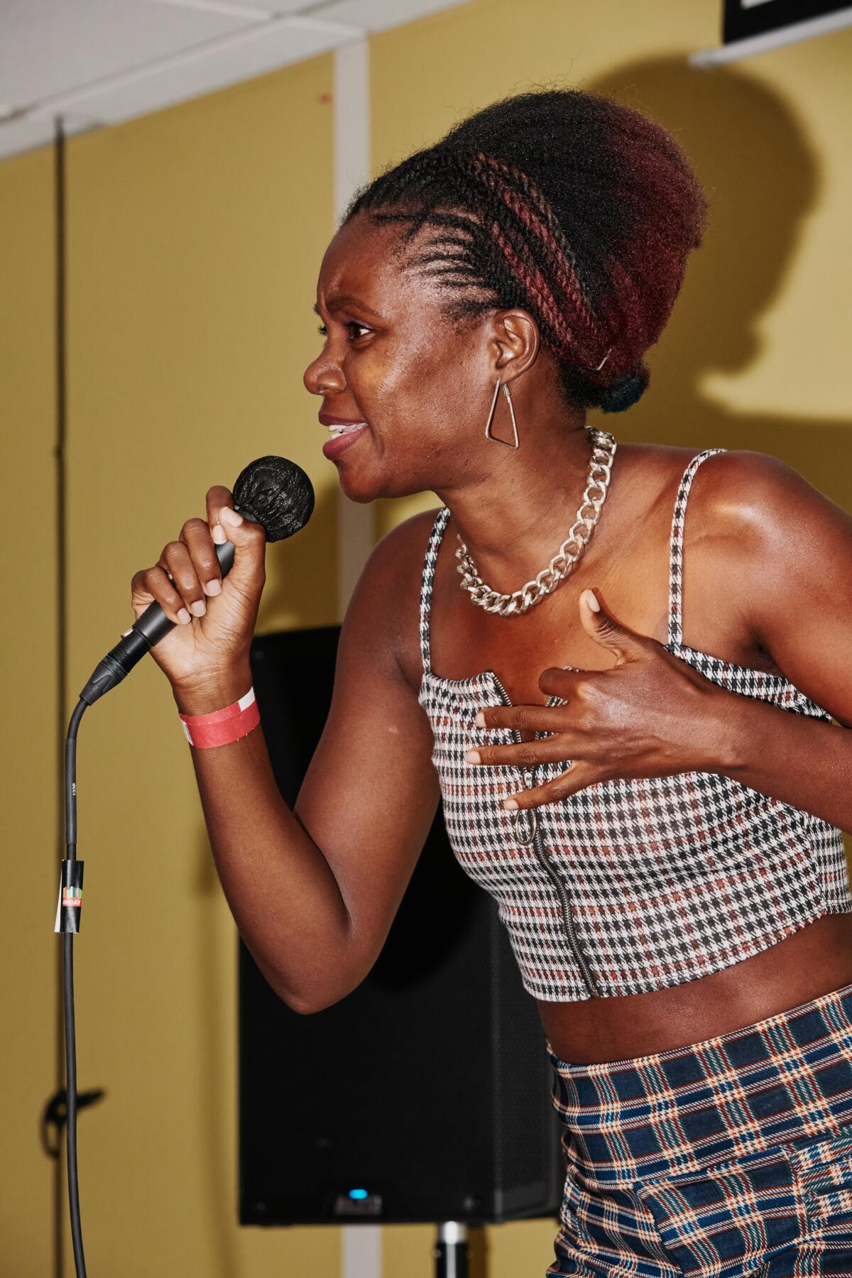 Chrissybaby performs a rap track at the Sunday Jump event inside the Pilipino Workers Center.