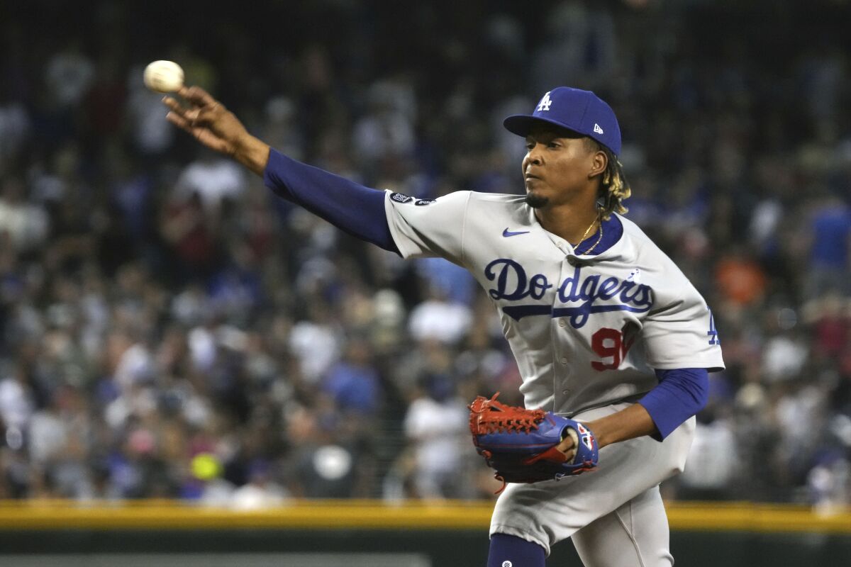 Dodgers reliever Edwin Uceta delivers during the eighth inning in the Dodgers’ 9-8 victory Sunday.