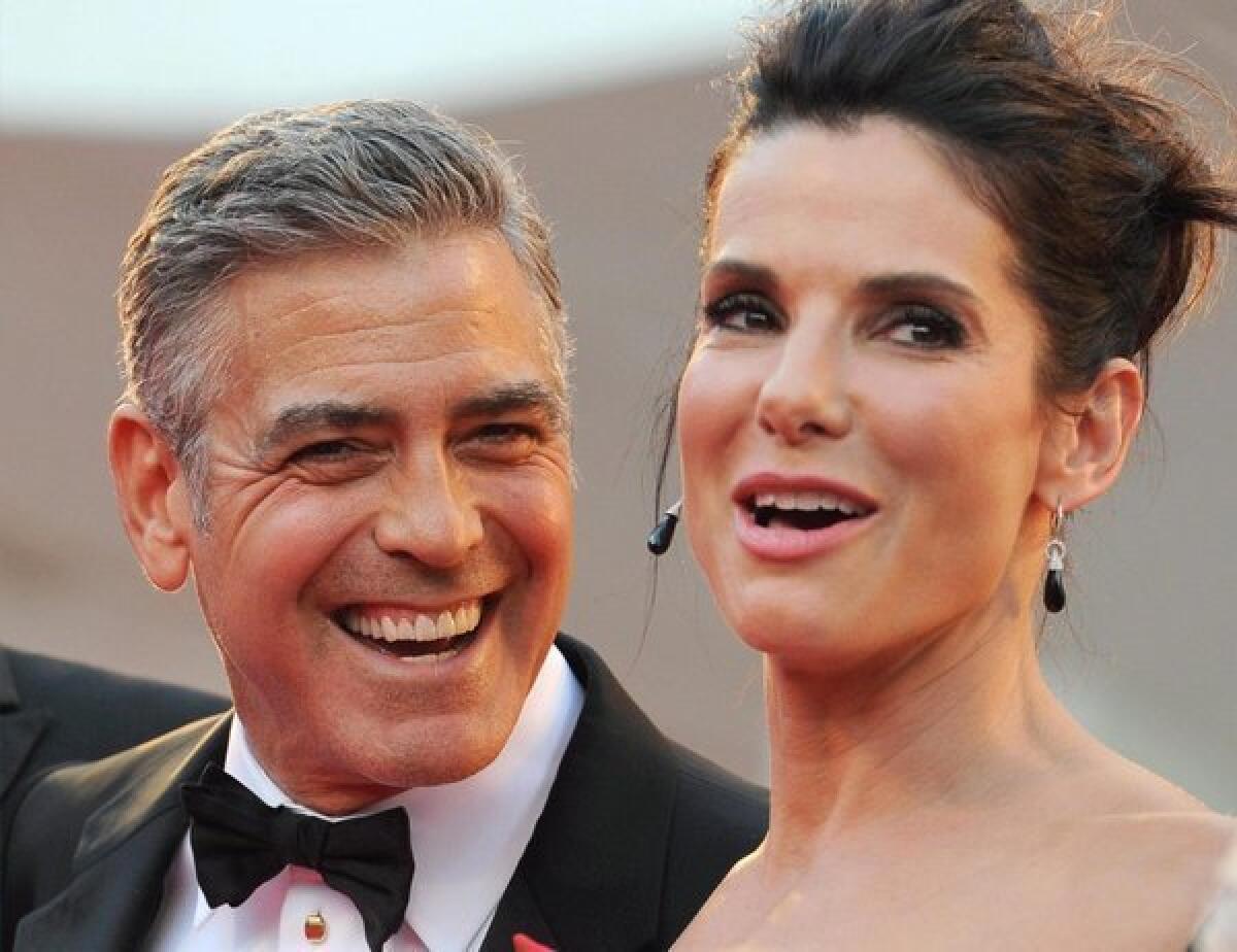 George Clooney and Sandra Bullock at the Venice Film Festival premiere of "Gravity."
