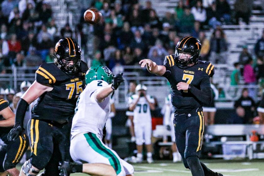 Brady Smigiel of Newbury Park passed for 435 yards and six touchdowns in win over Thousand Oaks.