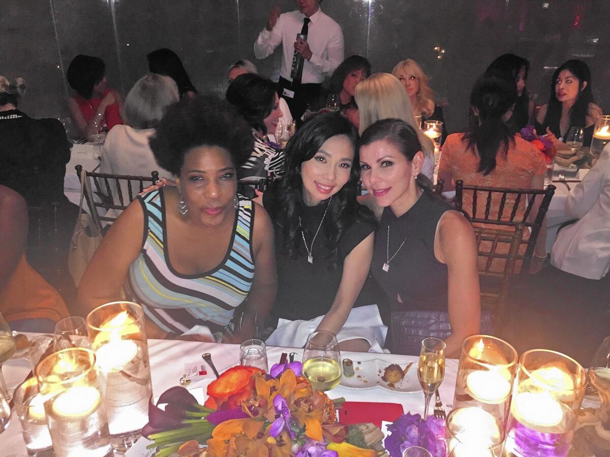 "American Idol" finalist Macy Gray, Elizabeth An, event co-chair and Heather Dubrow