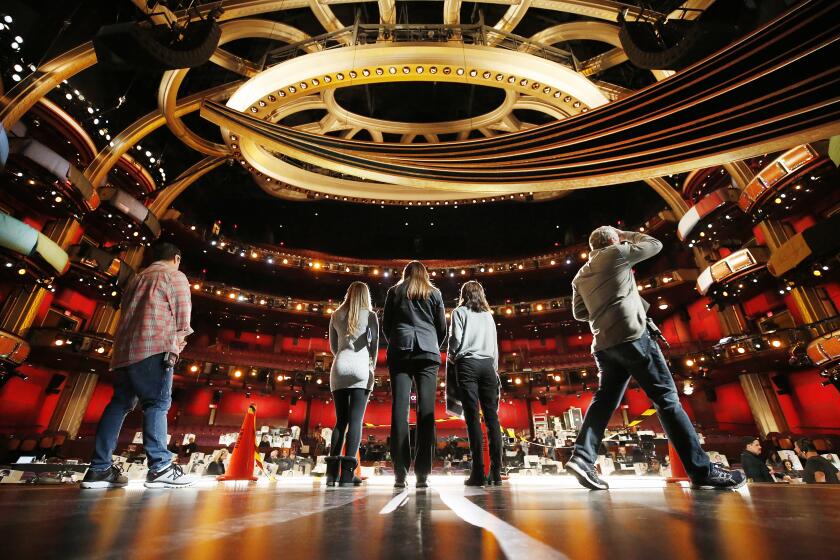 HOLLYWOOD, CA - FEBRUARY 6, 2020 Stage Managers John Esposito, left and Gary Natoli, right, direct rehearsal stand-ins Rochelle Rudolph, Bernadette Guckin and Terri Minton, left to right, as the production team rehearses on stage in the Dolby Theatre for the 92nd Oscars show as preparations continue for the Academy Awards this Sunday, February 9, 2020. (Al Seib / Los Angeles Times)