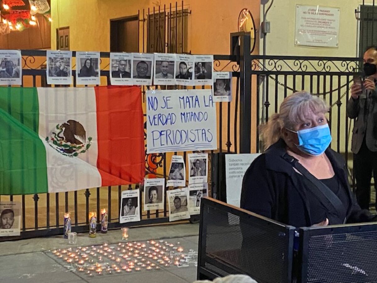 Sonia de Anda speaks at a vigil for the slain Mexican journalists, in front of the Mexican Consulate 