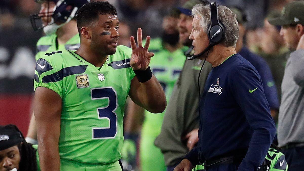Seattle Seahawks quarterback Russell Wilson (3) talks with head coach Pete Carroll during the first half against the Arizona Cardinals. The players’ union are still reviewing whether the Seahawks properly followed concussion protocols withl Wilson on Thursday night.