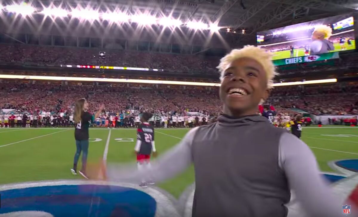 Super Bowl LIV got off to a memorable start with the NFL's "Take It To The House Kid" commercial to deliver the game ball in Miami Gardens, Fla.
