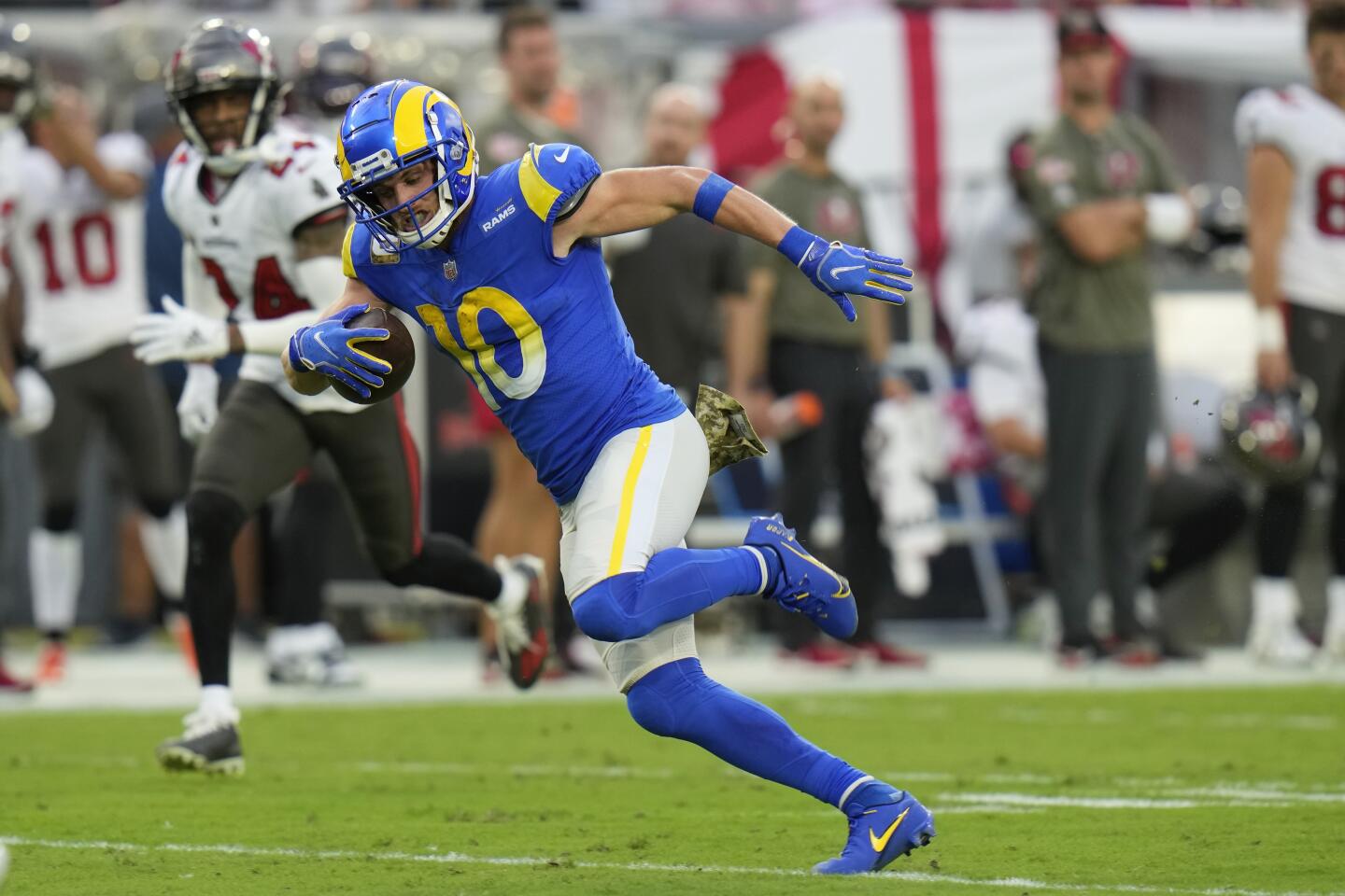 Los Angeles Rams wide receiver Cooper Kupp (10) runs to the end zone for a 69-yard touchdown reception during the first half of an NFL football game between the Los Angeles Rams and Tampa Bay Buccaneers, Sunday, Nov. 6, 2022, in Tampa, Fla. (AP Photo/Chris O'Meara)