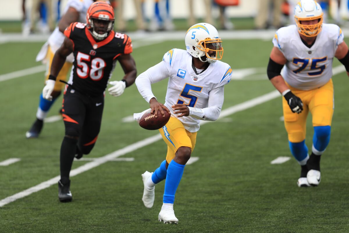 Chargers quarterback Tyrod Taylor scrambles during the first half against the Cincinnati Bengals.
