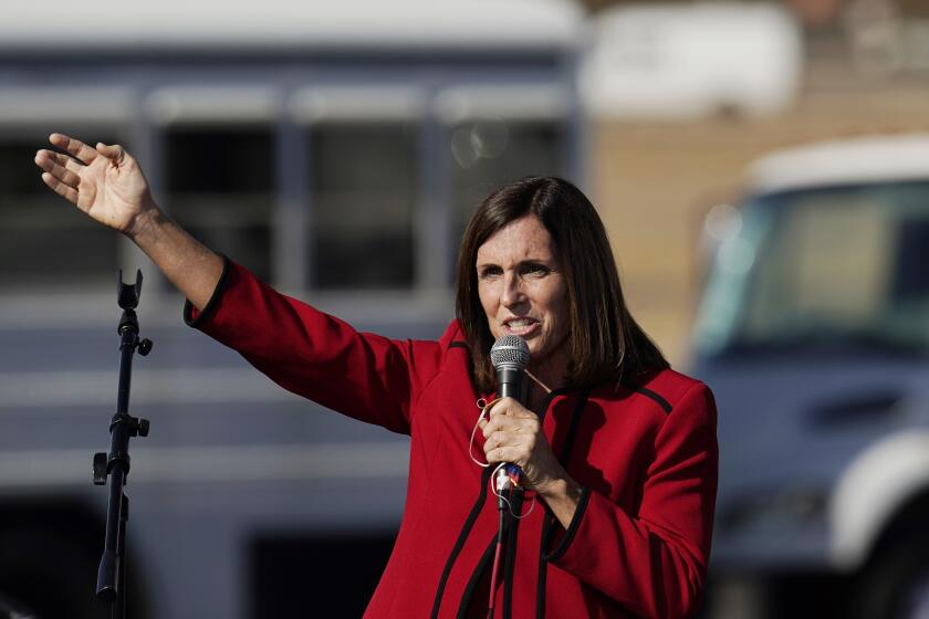 FILE - Sen. Martha McSally, R-Ariz., speaks during a rally at Tucson International Airport, Oct. 30, 2020, in Tucson, Ariz. McSally has said she was molested while jogging along the Missouri River in Council Bluffs, Iowa. She described the Wednesday, Nov. 8, 2023 morning attack in a video she posted online. (AP Photo/Ross D. Franklin, File)