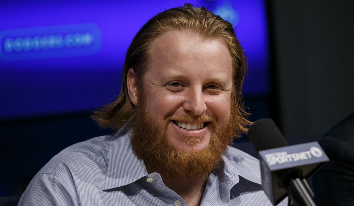 Justin Turner talks to reporters during a news conference Wednesday.