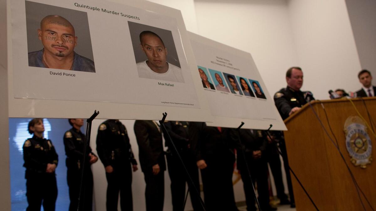 Then-Long Beach Police Chief Jim McDonnell in 2012 announces the arrest of David Ponce and Max Rafael in connection with the slayings of five people at a homeless encampment in 2008.