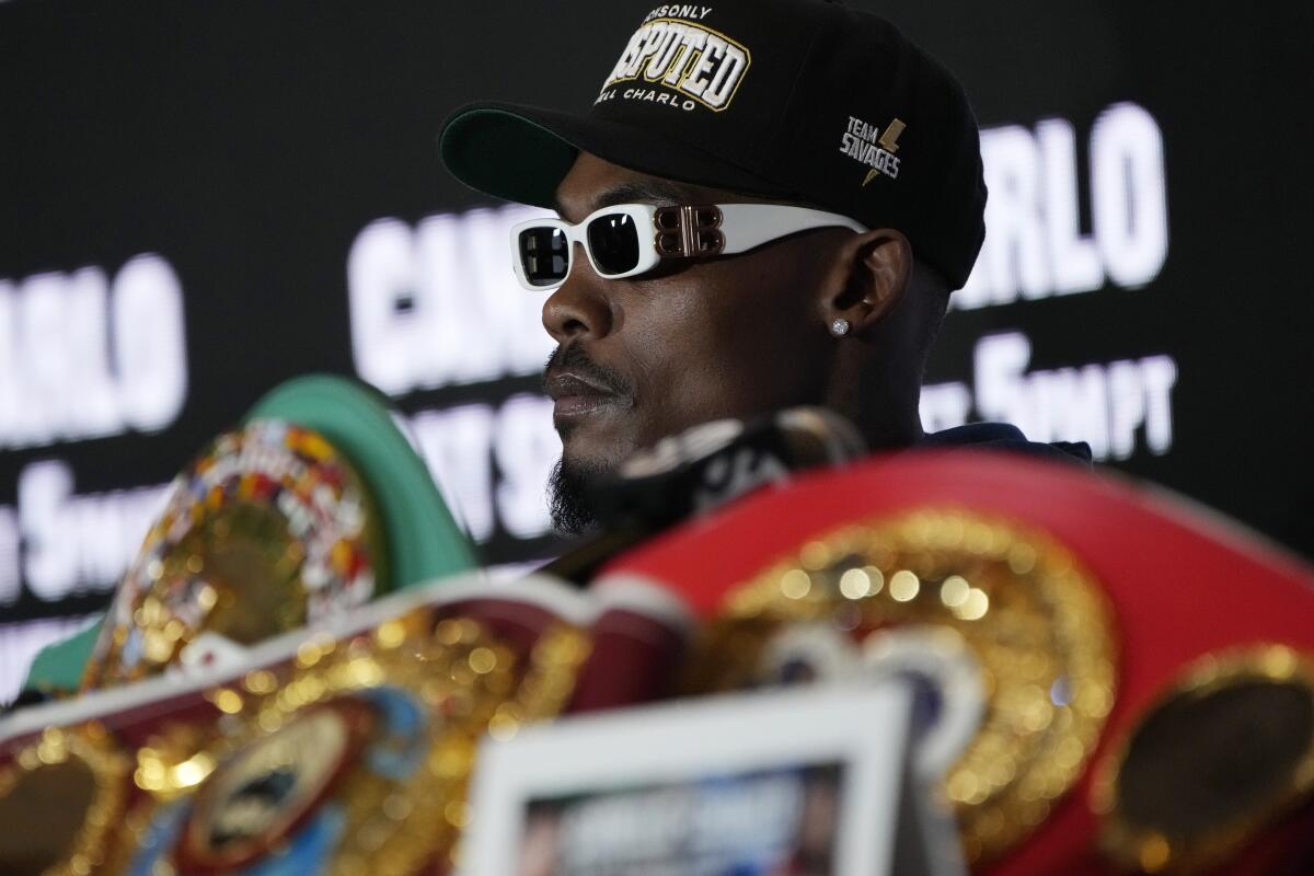 Jermell Charlo wears sunglasses while listening during a news conference Wednesday in Las Vegas
