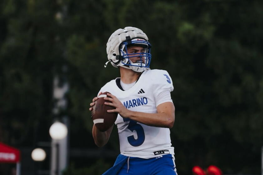 San Marino is 6-0 and quarterback Parker Wilson plays catcher for the baseball team.