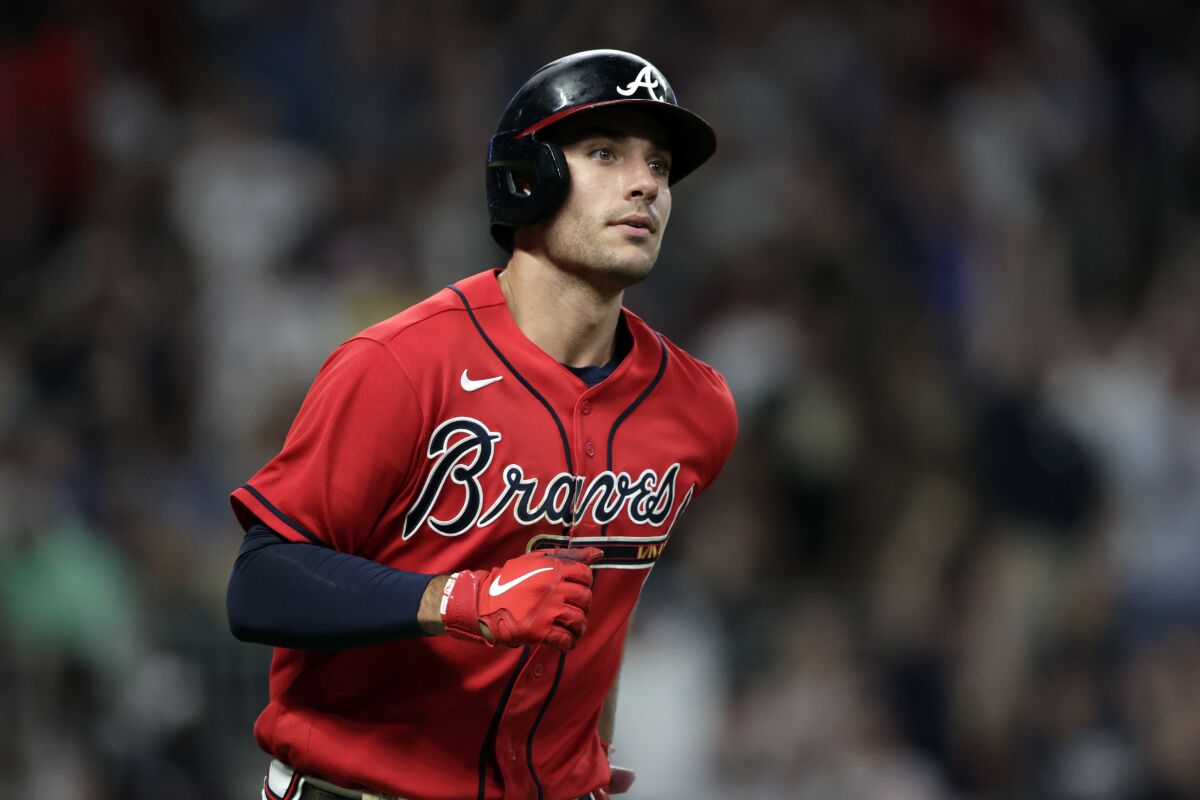 Atlanta Braves' Matt Olson runs the bases after hitting a home run against the Los Angeles Angels during the seventh inning of a baseball game Friday, July 22, 2022, in Atlanta. (AP Photo/Butch Dill)