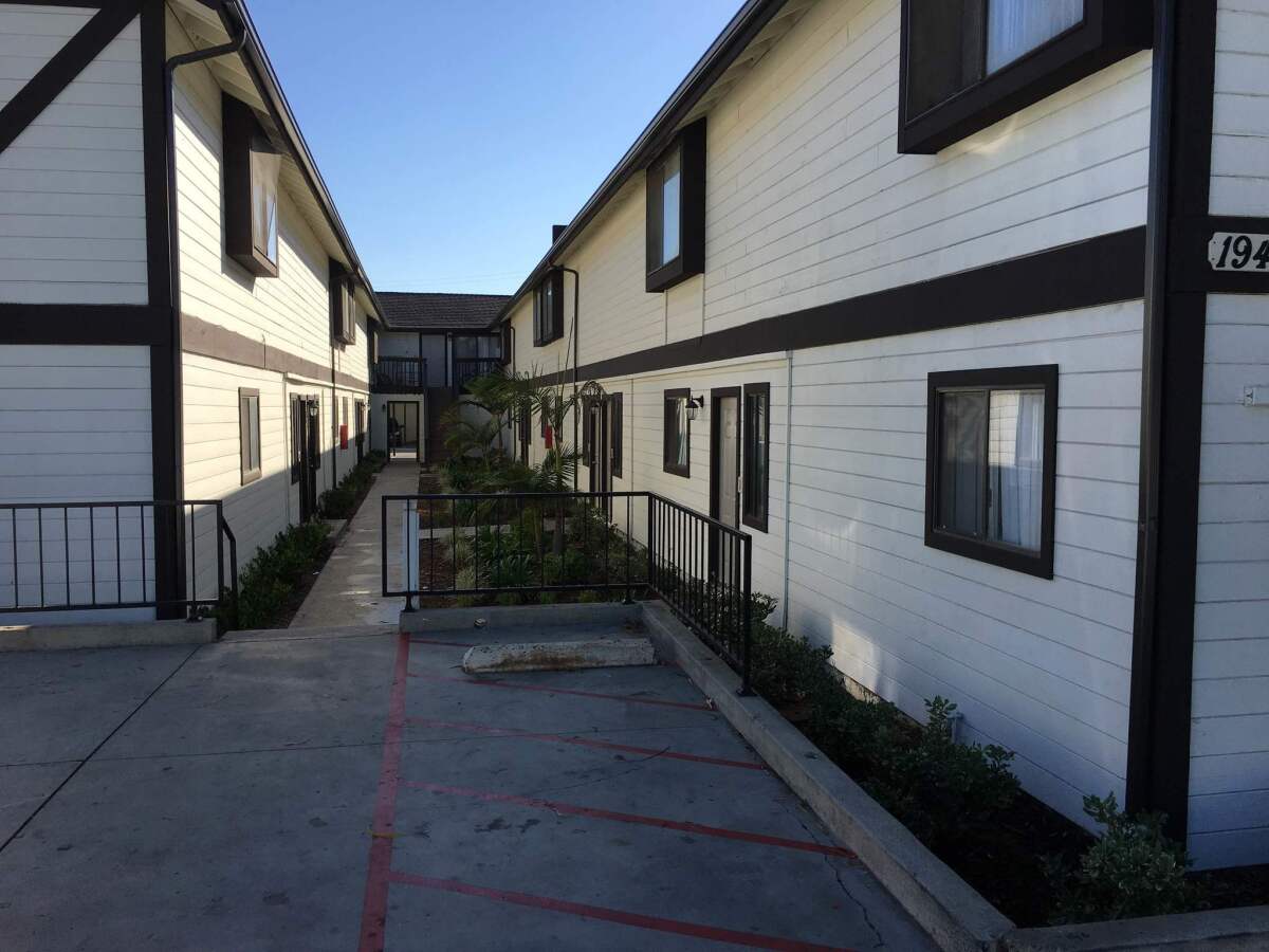 A 39-year-old woman and her two sons, ages 11 and 17, were stabbed Tuesday night in this apartment complex on Wallace Avenue in Costa Mesa, police said.