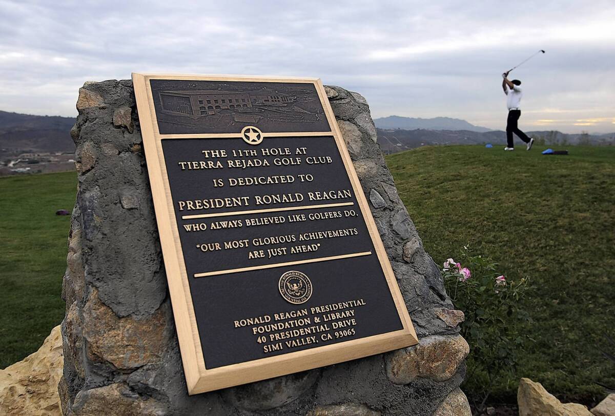 A plaque in honor of former President Reagan is located near the tee box on the 11th hole at the Tierra Rejada Golf Course in Moorpark.