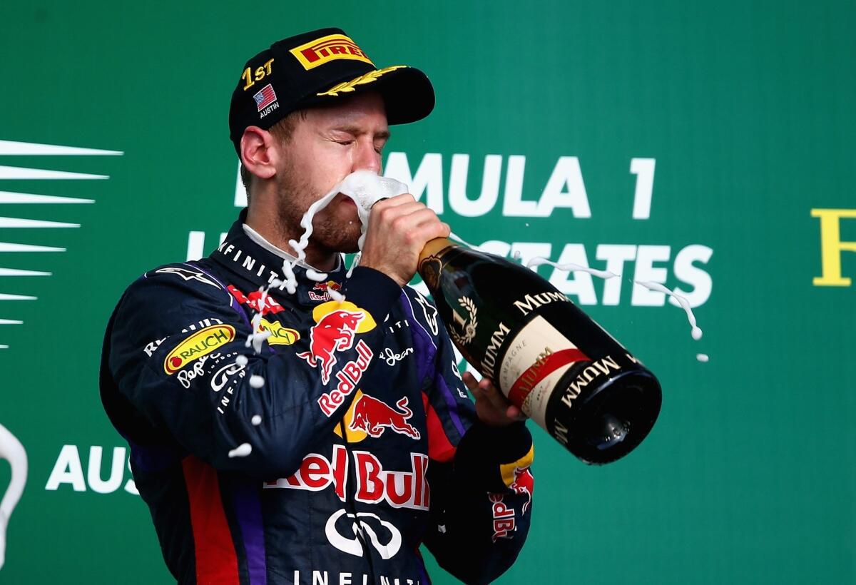 Formula One champion Sebastian Vettel celebrates after winning the U.S. Grand Prix on Sunday at Circuit of the Americas in Austin, Texas.