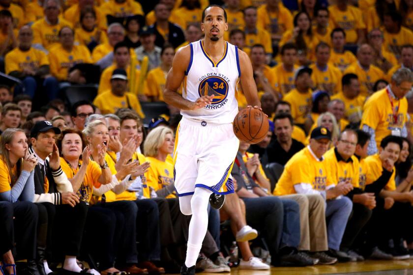 Golden State's Shaun Livingston dribbles up court in the second half against the Houston Rockets during Game 2 of the Western Conference Finals on Thursday.