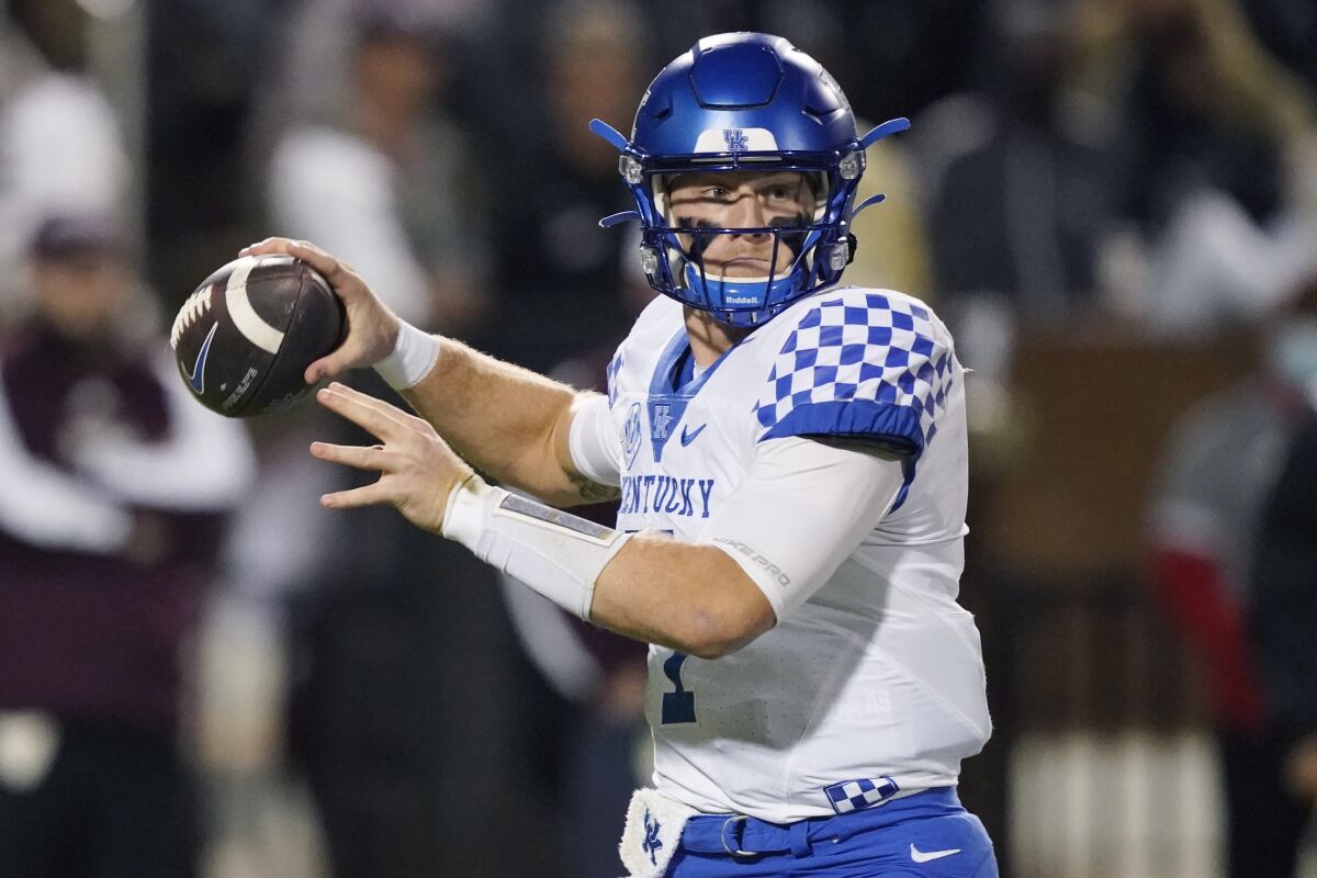 Kentucky quarterback Will Levis (7) passers against Mississippi State during the first half of an NCAA college football game in Starkville, Miss., Saturday, Oct. 29, 2021. (AP Photo/Rogelio V. Solis)