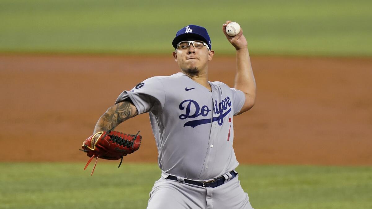 Dodgers starting pitcher Julio Urías delivers against the Miami Marlins on Thursday.