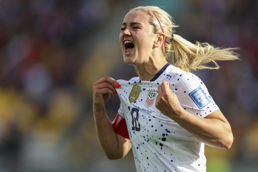 United States' Lindsey Horan celebrates her team's first US goal during the Women's World Cup Group E soccer match.