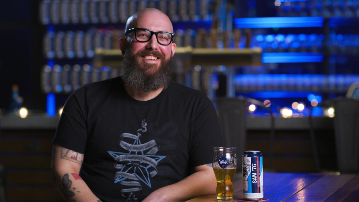 Boston Beer innovation brewer Rich Ferrell and the new Sam '76 ale-lager hybrid beer.