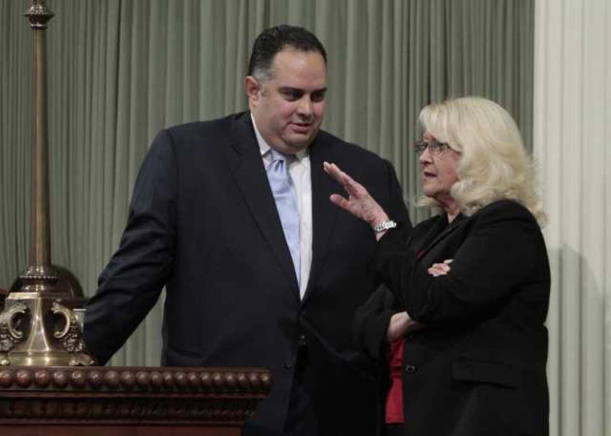 Assembly Speaker John A. Pérez (D-Los Angeles), left, and Assembly Republican leader Connie Conway (R-Tulare) confer at the Capitol in May 2011.