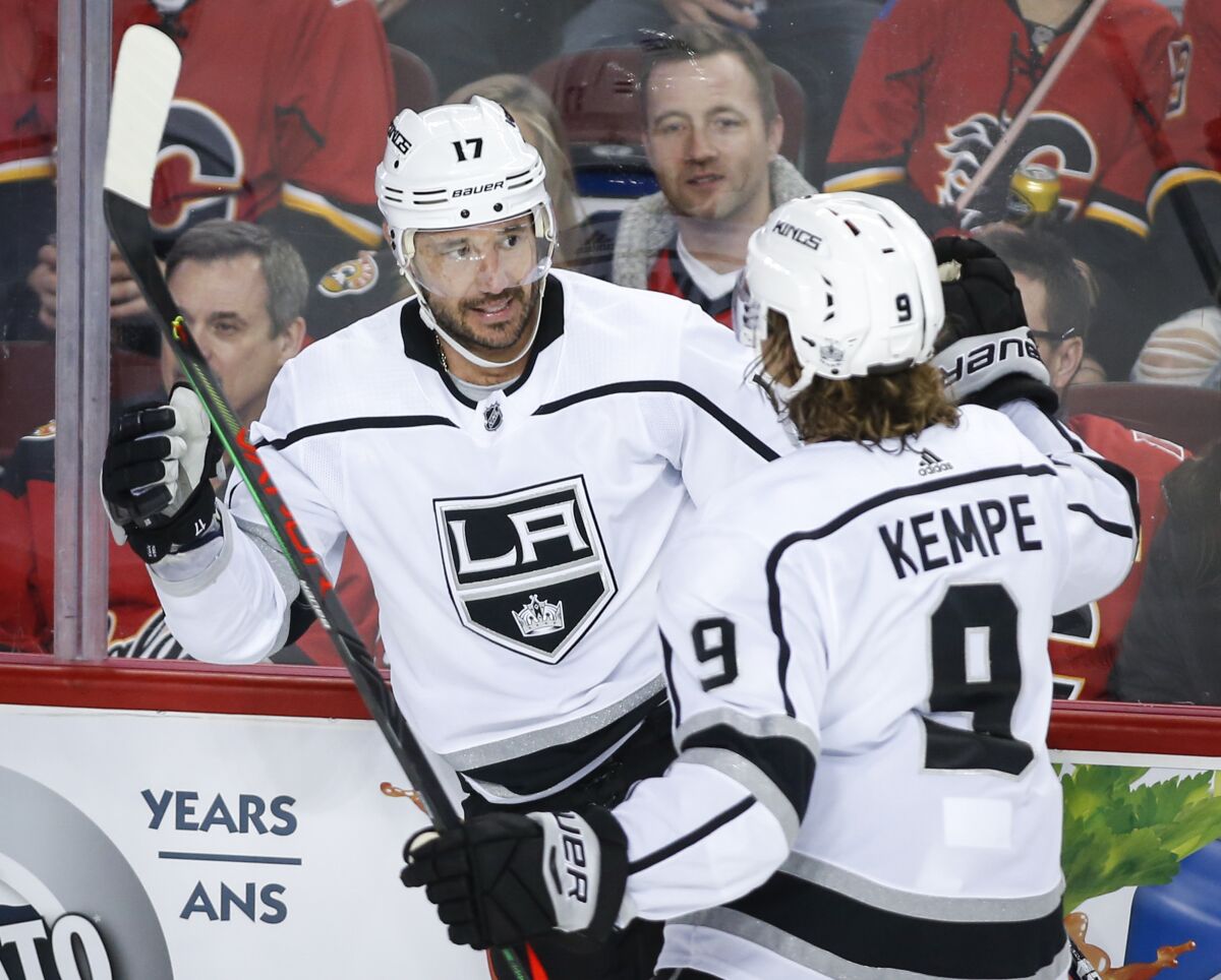 Kings' Ilya Kovalchuk, left, celebrates his goal with Adrian Kempe during the second period against the Calgary Flames on Tuesday in Calgary, Canada.