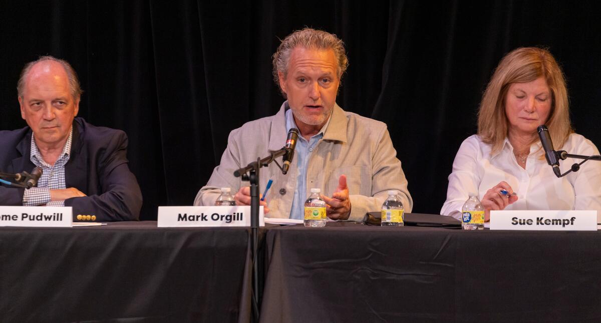 City Council candidate Mark Orgill speaks to the audience at the Forum Theater on Saturday in Laguna Beach.