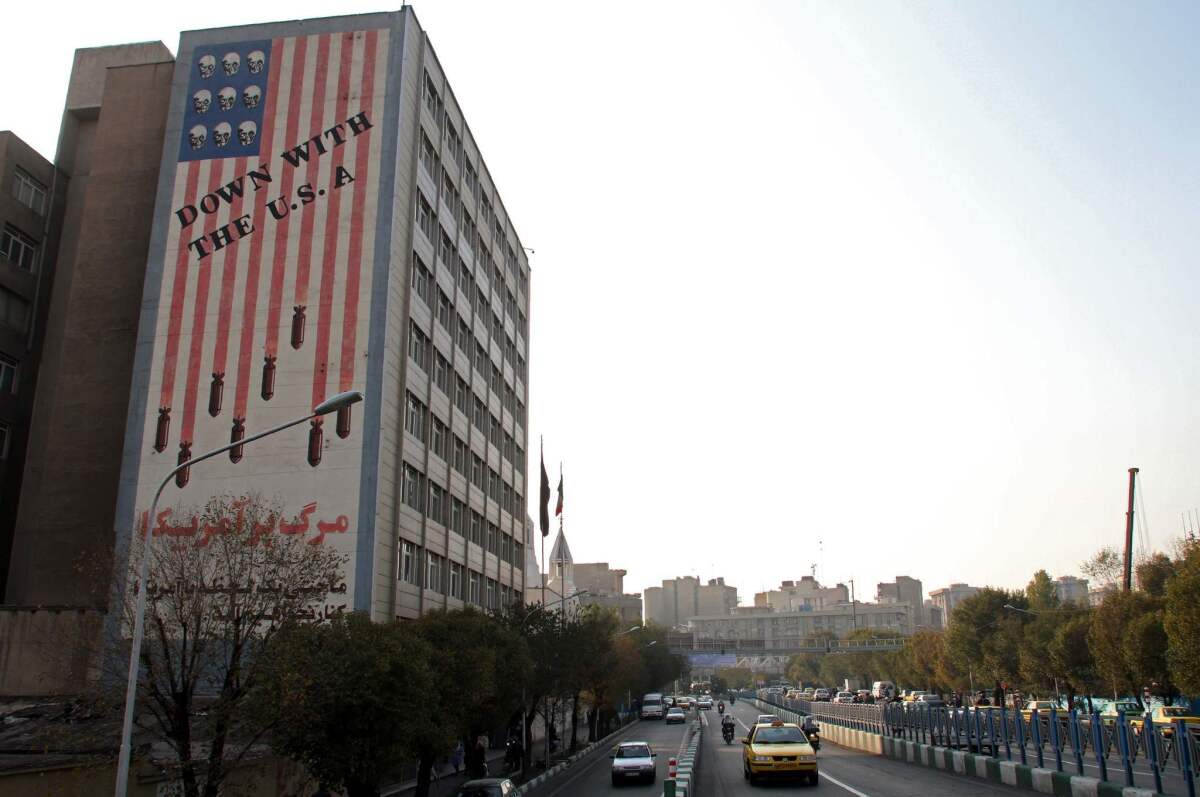 A building bearing anti-US graffiti in the Iranian capital of Tehran on Nov. 9, 2016. Iran's President Hassan Rouhani said there was "no possibility" of its nuclear deal with world powers being overturned by President-elect Donald Trump, despite his fervent threat to rip it up.