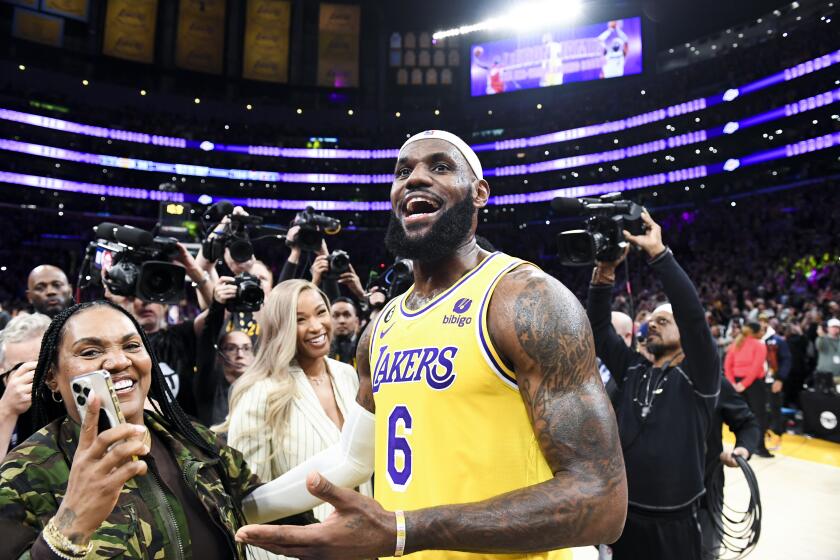 LOS ANGELES, CA - APRIL 29: LeBron James celebrates after becoming the all-time NBA scoring leader.