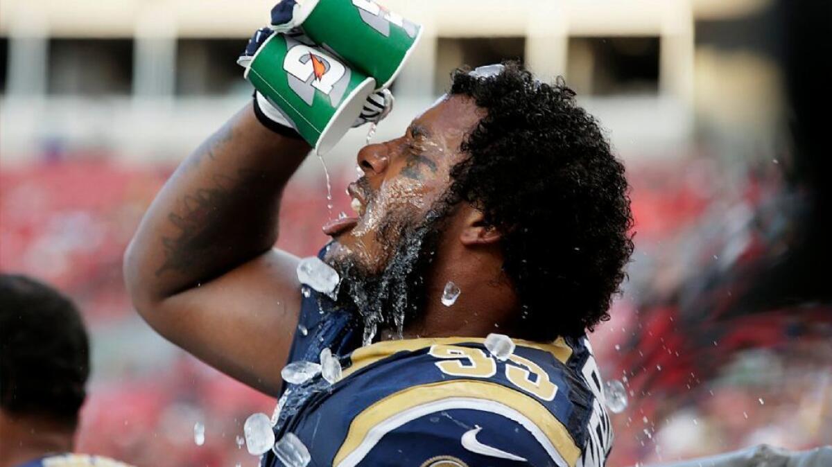 Rams defensive end Ethan Westbrooks cools off on the bench after running back a 77-yard fumble recovery against Tampa Bay in September.