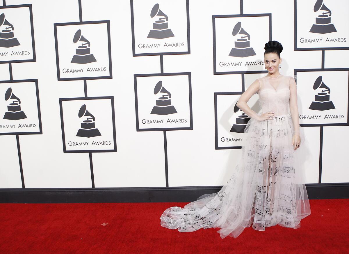 Katy Perry arrives for the 56th Annual Grammy Awards last year in a gown typical of her whimsical style.