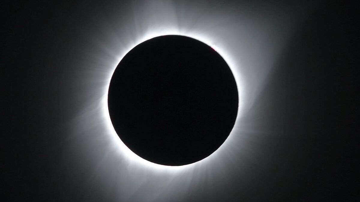 The sun in full eclipse over Grand Teton National Park in Wyoming on Monday.