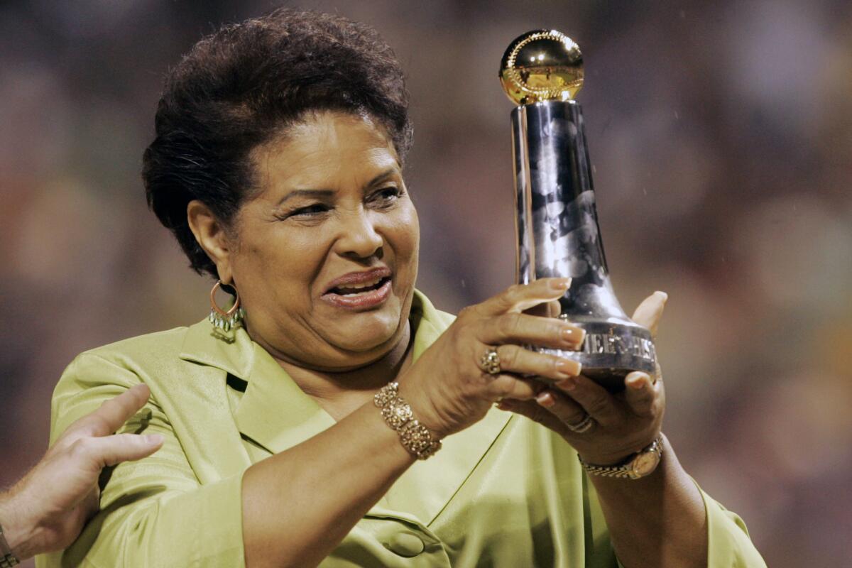 Vera Clemente, widow of Roberto Clemente, receives the commissioner of baseball's historic achievement award at the 2006 All Star Game in Pittsburgh.